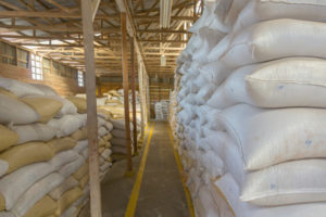 Stack of bags with food at warehouse