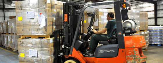 Fork lift in a large warehouse